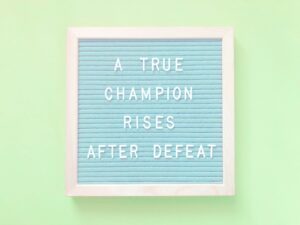 A true champion rises after defeat. Quote.