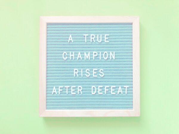 A true champion rises after defeat. Quote.